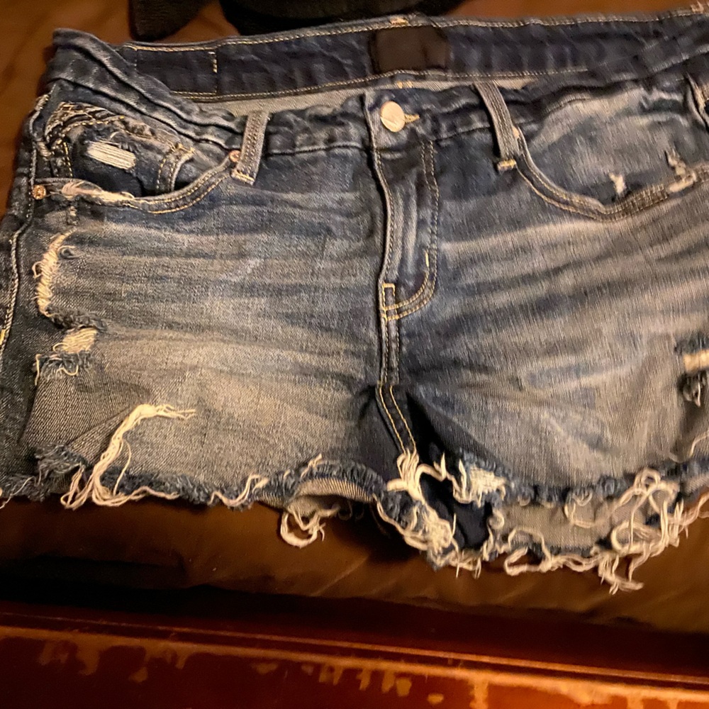 Buckle black distressed shorts